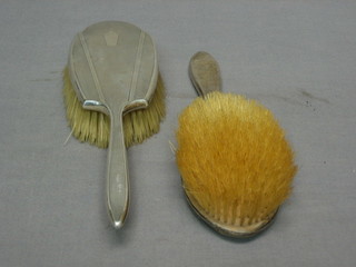2 silver backed hand mirrors