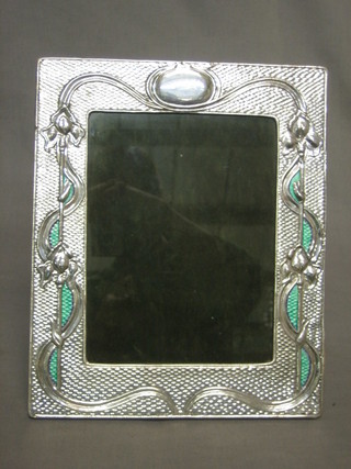 A modern Art Nouveau style embossed silver easel photograph frame 11" x 9 1/2" 