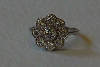 A lady's 18ct white gold cluster dress ring set 9 diamonds approx. 1.50ct