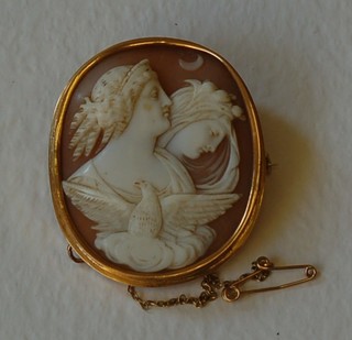 A 19th Century shell carved cameo portrait of 2 ladies contained in a gilt metal mount 2"