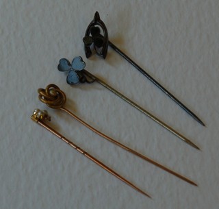 2 gold stick pins set pearls and 2 other gold stick pins set hardstones
