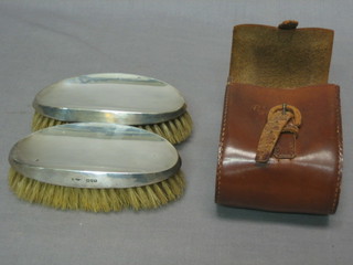 A pair of silver backed military hair brushes, Chester 1913