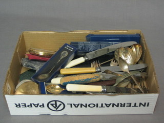 A collection of various compacts, flatware etc