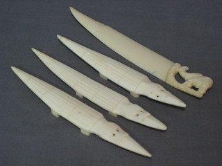 A carved ivory paper knife, the handle decorated an elephant 7" and 3 ivory figures of crocodiles