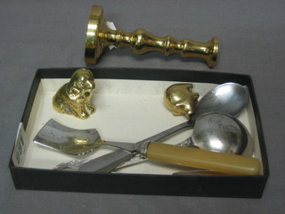 A brass candlestick 4", a miniature brass figure of a pig, do. dog and a small collection of flatware