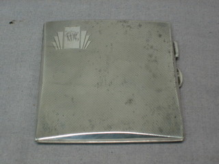A silver cigarette case with engine turned decoration Birmingham 1934, 3 ozs