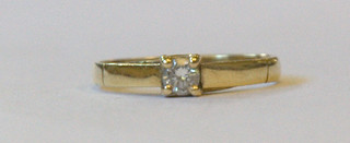 A lady's 18ct gold dress ring set a diamond