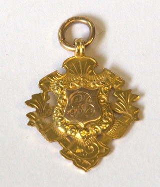 A 9ct gold watch chain medallion