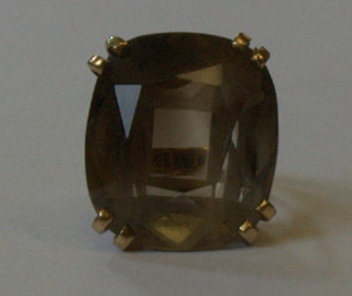A 9ct gold dress ring set a rectangular cut smokey quartz