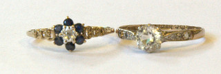 A lady's 9ct gold dress ring set a white stone and a gold cluster dress ring set blue and white stones