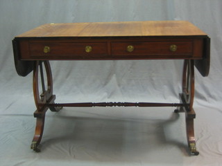 A 19th Century mahogany sofa table fitted 2 frieze drawers and raised on lyre supports with turned stretcher 41"