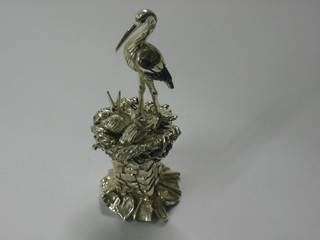 A modern miniature silver model of a stork with nest 2 1/2"