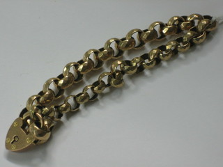 A "gold" belcher link bracelet with gold padlock clasp