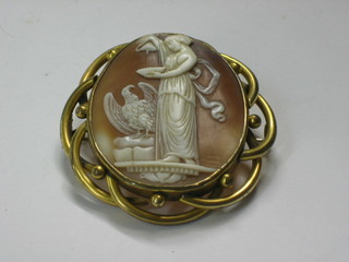 An oval shell carved cameo portrait brooch contained in a gilt metal mount 2"