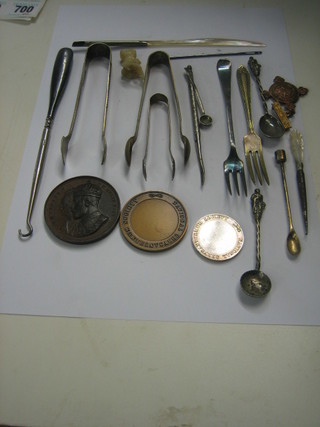 A bronze George V Coronation medallion, a collection of plated flatware etc