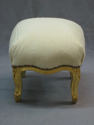 A square French style gilt painted footstool with upholstered seat, raised on cabriole supports 14"