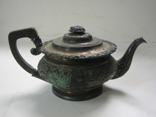 A Georgian style circular silver plated teapot