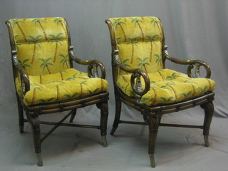 A pair of reproduction Empire style bamboo and gilt metal mounted carver chairs