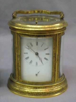 A 19th Century  French oval repeating and striking carriage clock, case marked Royal Mersey Yacht Club July 7 1873 Elaine W G Jameson