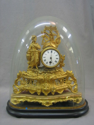A French 8 day timepiece with enamelled dial and Roman numerals contained in a gilt spelter case decorated a figure of a lady farmer, contained under a glass dome
