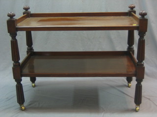 A William IV mahogany 2 tier buffet raised on turned and reeded supports 40"