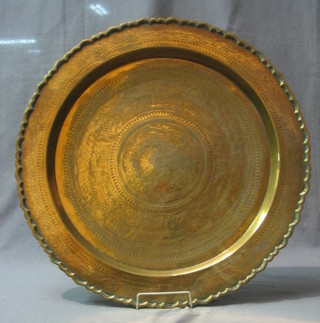 A circular Benares brass tray 22"
