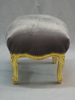 A French style gilt painted stool with upholstered seat, raised on cabriole supports 14"