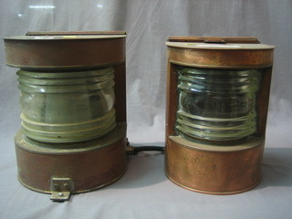 A pair of copper ships lanterns