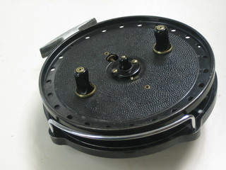 A Young's Trudex centre pin fishing reel 5 1/2"