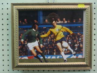 A colour photograph of George Best and Gordon Banks in England strip signed by Gordon Banks, with certificate of authenticity 7" x 9" 