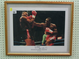 A colour photograph of Frank Bruno and Oliver McCall in the ring, signed by Frank Bruno 11" x 16", with certificate of authenticity