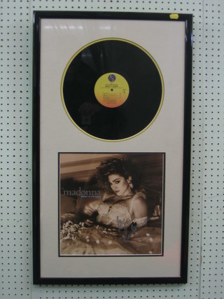 Madonna, a signed record cover together with the record "Like a Virgin" with certificate of authenticity