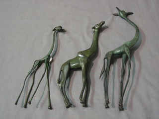 3 bronze figures of standing giraffes 10"