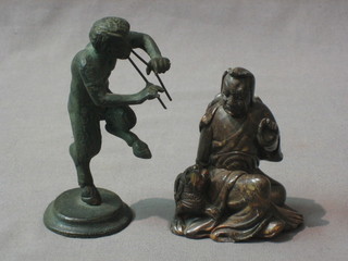 A bronze figure of a standing faun 4 1/2"