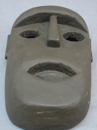 An Eastern hardwood mask 12"