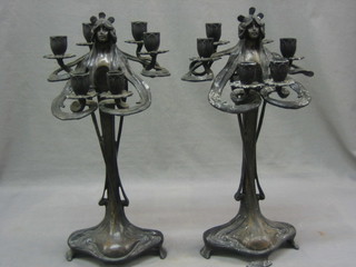 An impressive pair of bronze Art Nouveau style 6 light candelabrum decorated standing ladies 17"