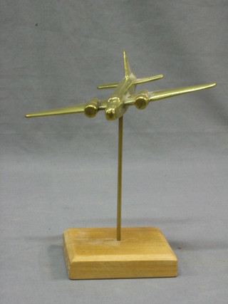 A WWII brass aircraft recognition model of a Wellington Bomber on an oak stand 7"