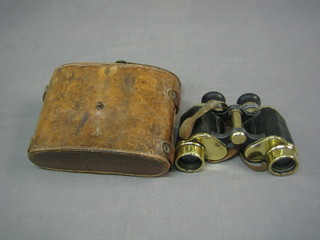 A pair of brass and leather cased field glasses by Hunalex of Paris