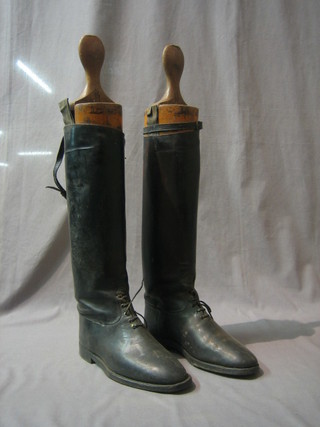 A pair of black leather riding boots complete with trees