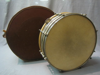 A circular chrome snare drum