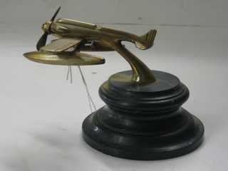 A chromium plated mascot/trophy in the form of a sea plane 3 1/2"