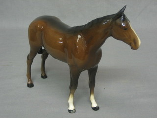 A Beswick figure of a standing bay horse 8"