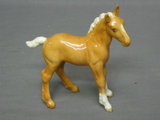 A Beswick figure of a standing Palomino foal 6"