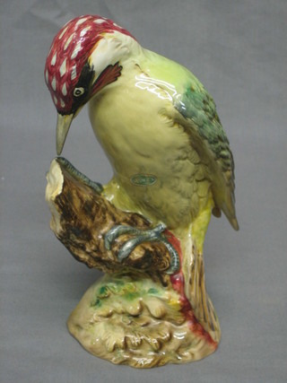 A Beswick figure of a Woodpecker, base marked 218 8"