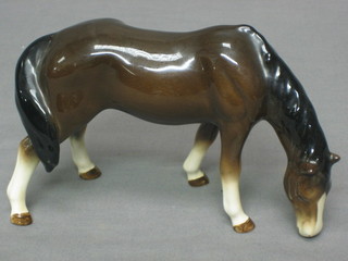 A Beswick figure of a standing grazing bay horse 4 1/2"