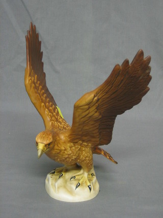 A  Beswick figure of a Golden Eagle with wings outstretched, base marked 20 62, matt finished 9"