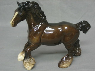 A Beswick figure of a bay shire horse with left hoof crooked, 8"