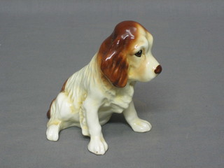 A Sylvac figure of a seated dog, base marked Sylvac 18 (foot f and r) 5"