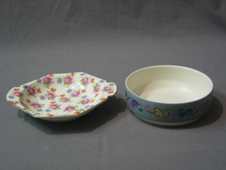 An octagonal twin handled Royal Winton dish with floral decoration 6" together with a circular Poole Pottery bowl 5 1/2"