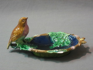 A Victorian Majolica style oval shaped dish decorated a bird (f) 8"